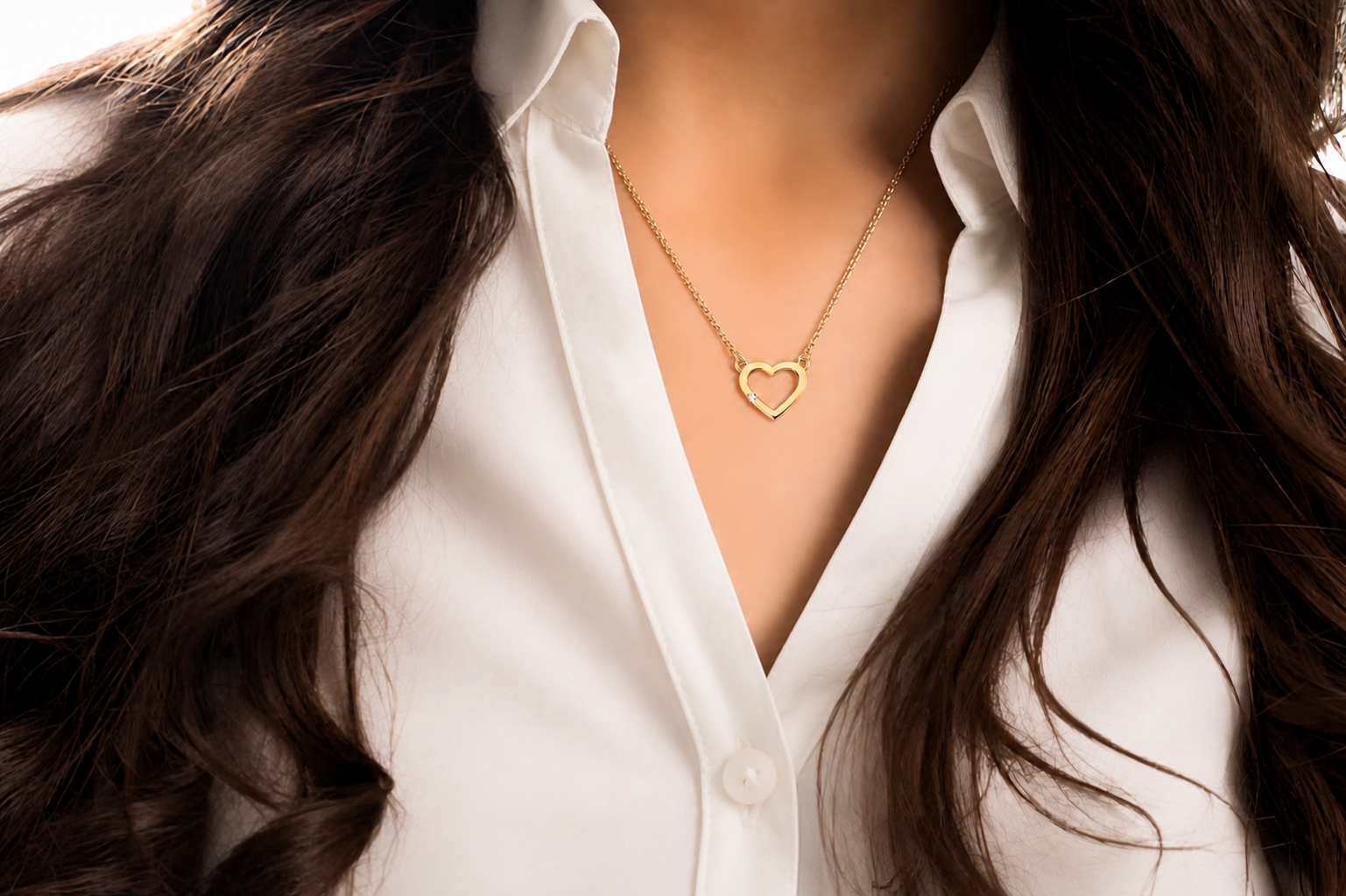 Gold heart pendant on a fine chain, a Mother’s Day jewellery best seller