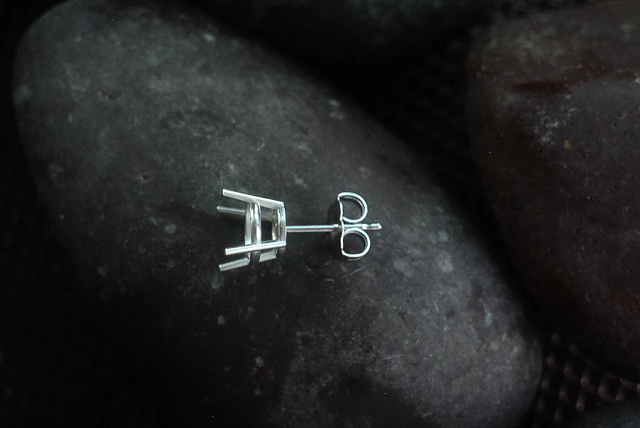 Gold findings by weight: 14kt stud posts and butterfly backs on grey stone